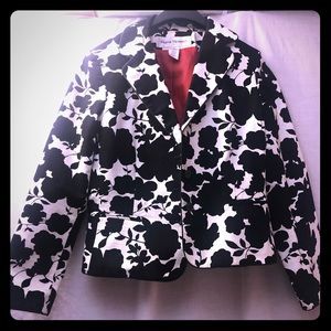 Rena Rowan, a War Refugee, Top Designer